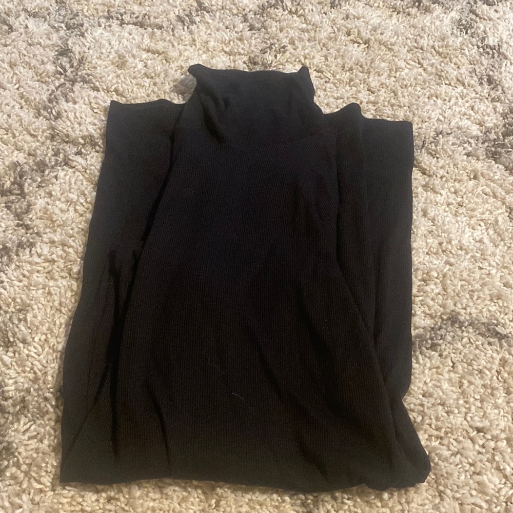 Long sleeve, tight black turtleneck dress